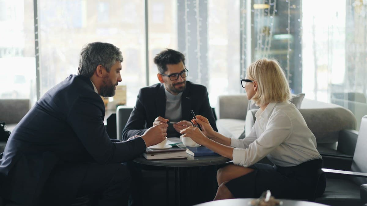 Business colleagues discussing work together