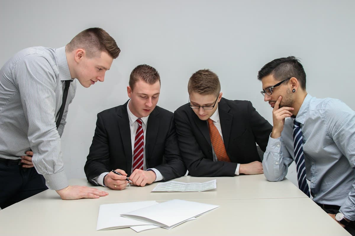 Colleagues reviewing a document together